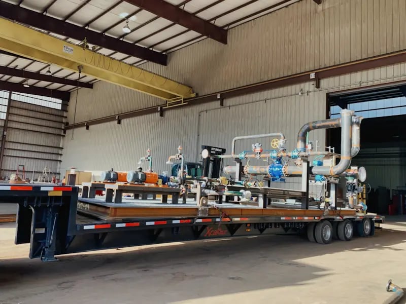 32-inch Pipe Rack Modules and 6-inch Water Transfer Skids heading out the door of the Power Service facility to two different West Texas locations. 32-inch Pipe Rack Modules and 6-inch Water Transfer Skids heading out the door of the Power Service facility to two different West Texas locations.